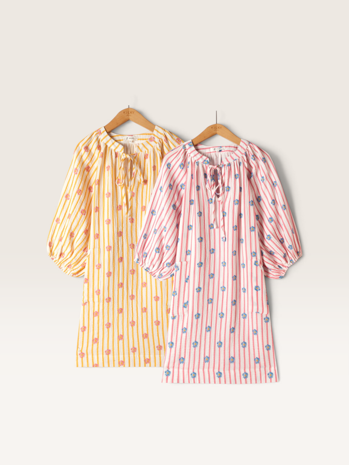 Robe Kilky Sable_blanc_collection en coton rayé à fleurs, disponible en jaune et rose avec manches bouffantes.